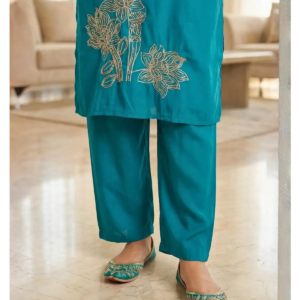 Detail of floral gold sequins and embroidery on teal Roman Silk Suit Gold Handwork kurta.